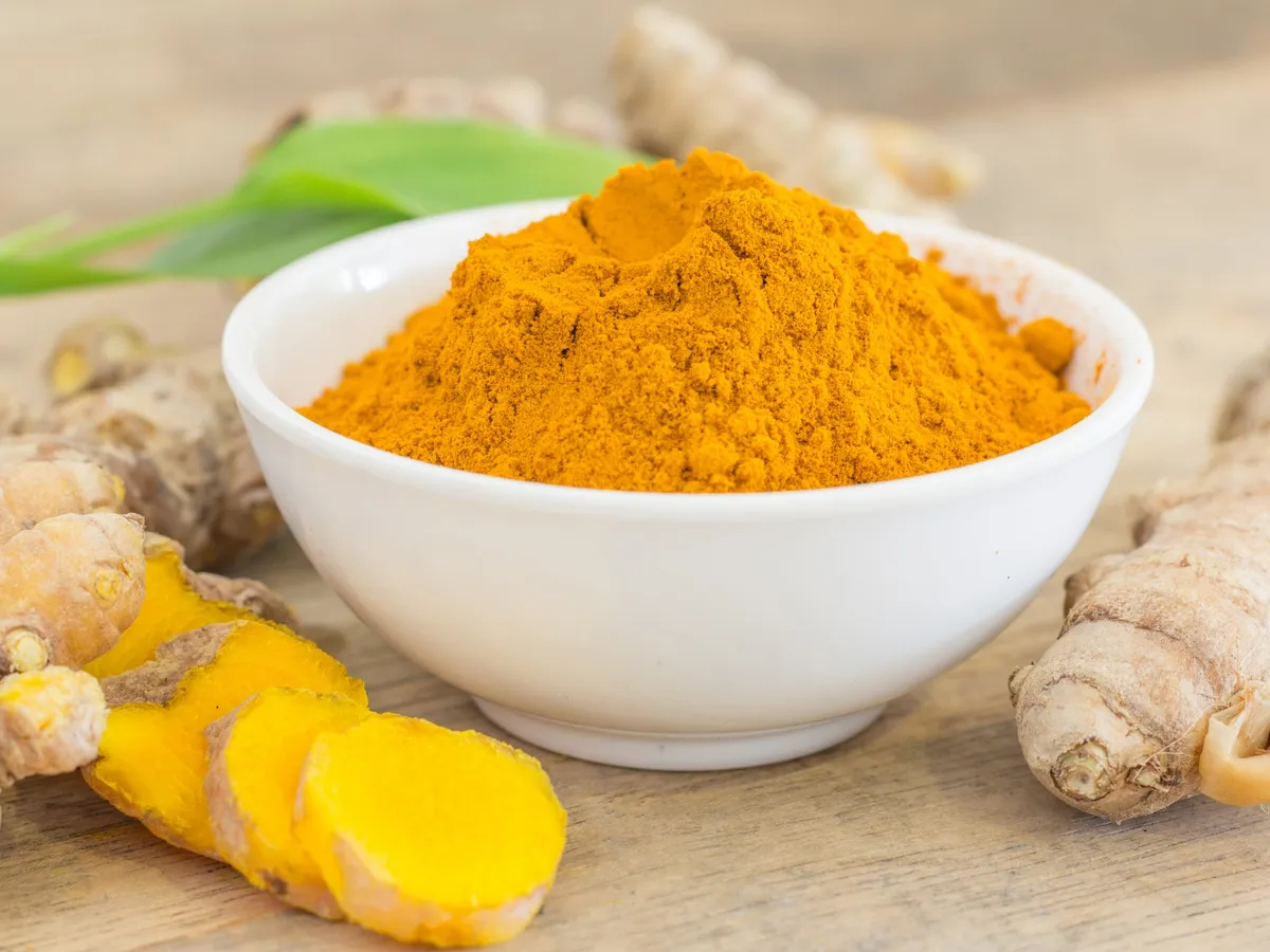 Whole dried turmeric fingers in a sack